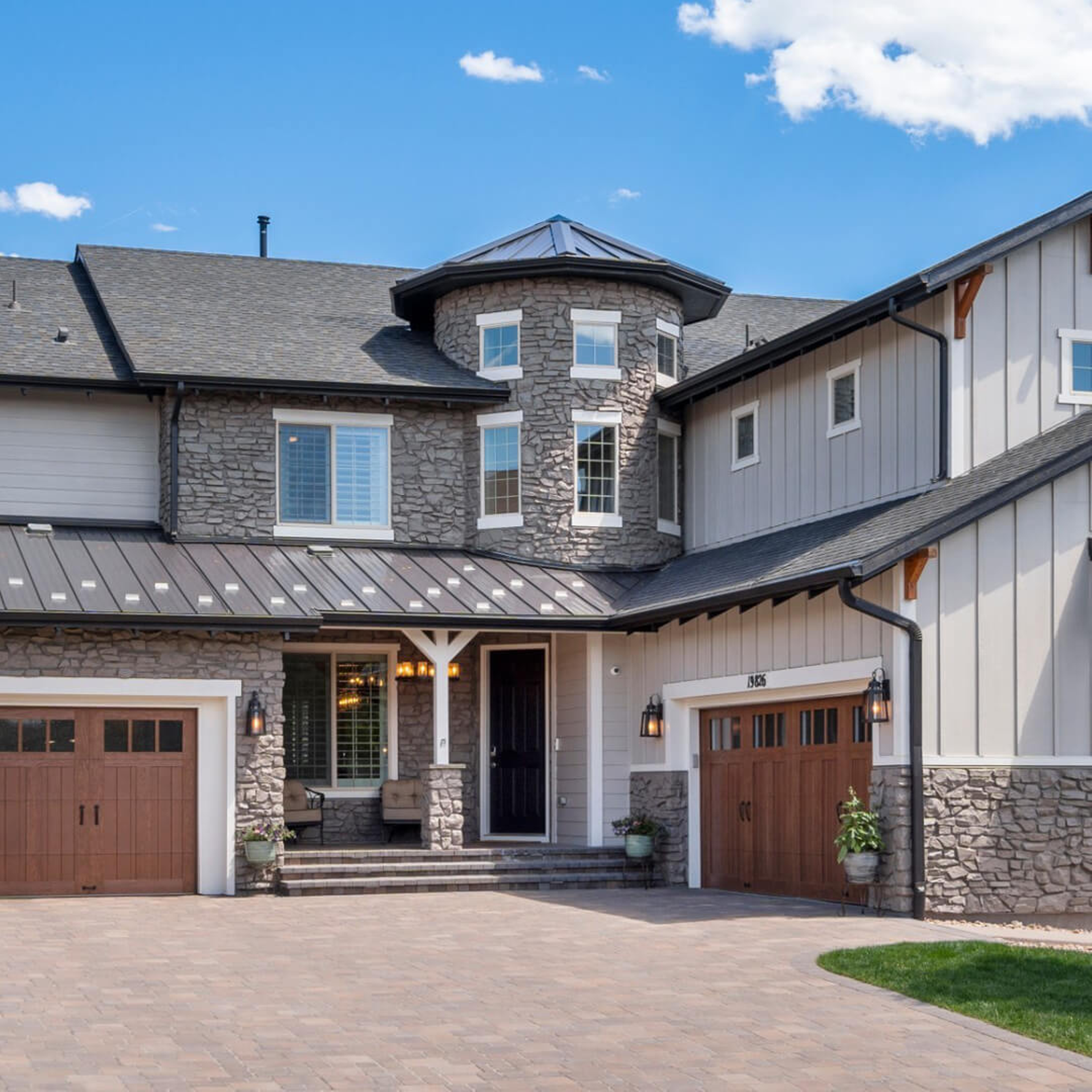 Luxurious multistory house with 2 car garage.